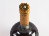 a bottle of wine that is sitting on a table