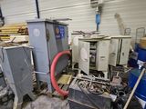 a room with a lot of trash and other things in it