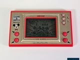 a red and silver electronic game with mickey mouse on the screen