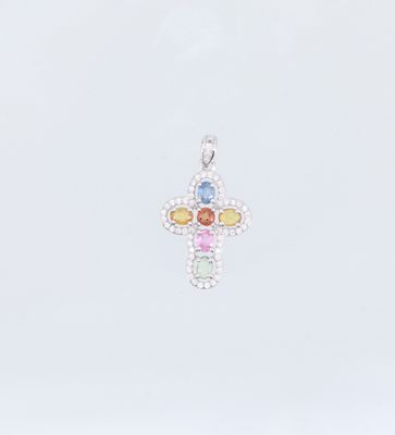 un gros plan sur un pendentif en forme de croix orné de pierres multicolores