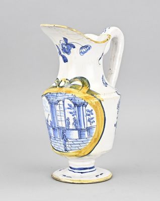 un vase bleu et blanc avec un oiseau dessus
