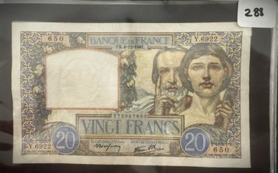 un ancien billet de 20 francs français sur lequel figurent les portraits d'un homme et d'une femme