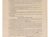 un gros plan sur une feuille de papier sur laquelle repose une pièce de monnaie