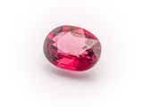 a pink tourmaline gems on a white background