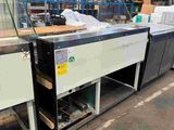 a picture of a machine that is sitting in a warehouse