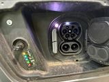 a close up of the inside of a car ' s trunk