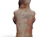 an image of a clay statue of a woman