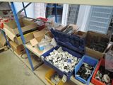 many boxes of assorted items sitting on a shelf