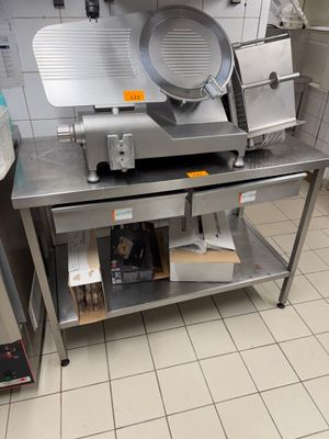 an image of a commercial kitchen with stainless steel appliances