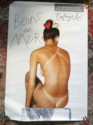 a poster with a picture of a naked woman on it