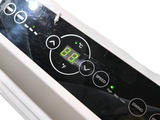 a close up of a digital clock on the side of a refrigerator