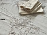 a white table cloth with a design on it