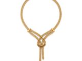 un collier en or avec un nœud et une chaîne