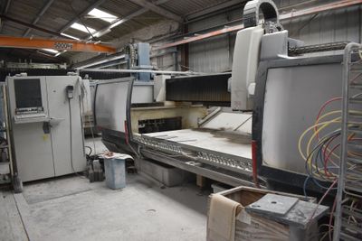 a large machine that is sitting in a warehouse