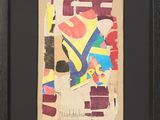 tableau encadré représentant une peinture abstraite colorée sur une feuille de papier