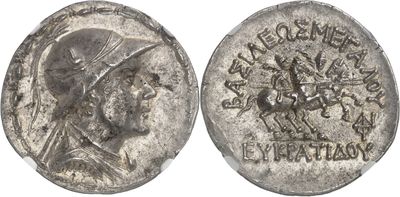 a silver coin with an image of a man on a horse