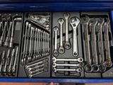 a blue box with a variety of tools in it