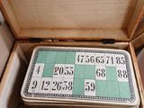 a wooden box with a game board inside of it