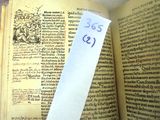 a book with a piece of paper on top of it