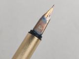a pen that is sitting on top of a table