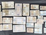 several different types of stamps are displayed on a black surface