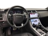 the interior of a car with a steering wheel, dashboard, and dashboard controls