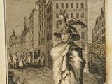 un vieux livre sur lequel figure le dessin d'une femme marchant dans une rue