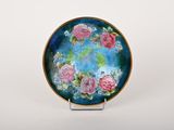 a picture of a plate with flowers painted on it