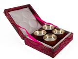three silver bowls in a red box with a pink ribbon