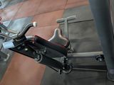 a bike that is sitting on the floor in the gym