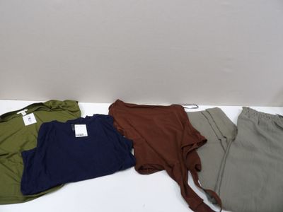 three pairs of men ' s underwear are laid out on a white surface