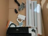 a box with a laptop and other electronics inside of it
