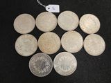 six different types of coins on a black surface with a price tag
