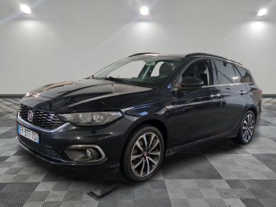 the front view of a black car on a checkered floor