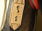 a close up of a military uniform with a chain on it
