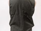 the back of a black vest on a mannequin mannequin
