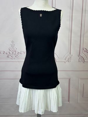 a picture of a black and white dress on a mannequin