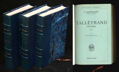 four books that are sitting next to each other on a table
