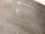 a close up of a metal pan with some food in it