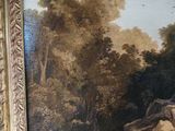 a picture of a painting on the wall of a room