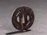a small metal object that is sitting on a table