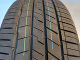 the tire of a car is shown with a green line on the tread