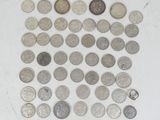 a lot of coins that are sitting on a table