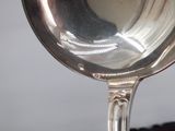a spoon that is sitting on top of a table
