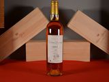 a bottle of wine that is sitting on a table