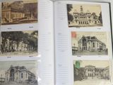 an open book with a bunch of old photos on it