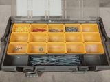 a tool box with many different types of screws in it
