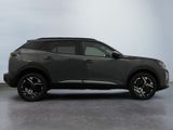 the new nissan kickstart suv is parked in a garage