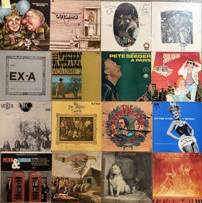 a collage of various album covers on a wall