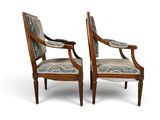 pair of louis xvi style walnut armchairs with upholstered upholstered arms